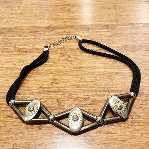 Silver geometric pattern diamond & oval belt w/ black elastic. Fits Waist 29-37"